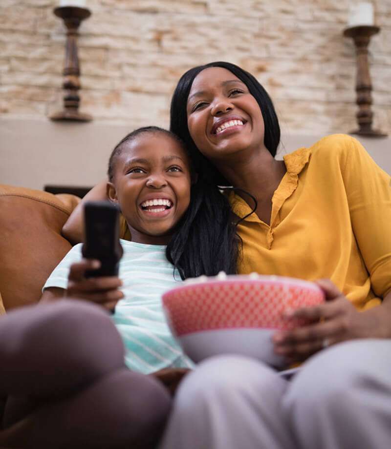 mom and child watching TV