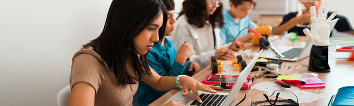 A group of teens learning from home illustrate some of the factors to consider when deciding if you need 600 Mbps internet.